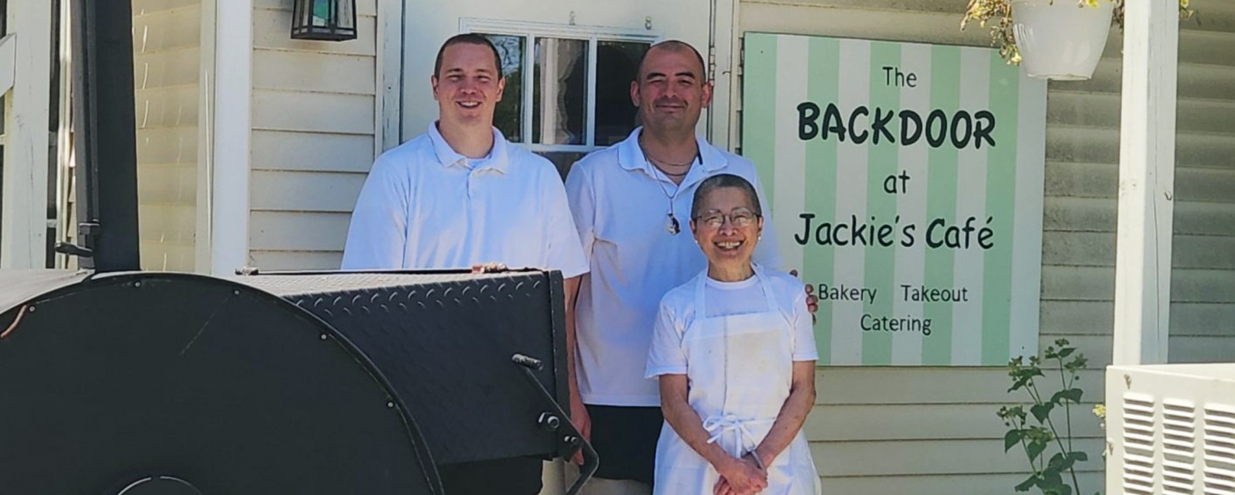 pitmasters standing with chef jackie shen